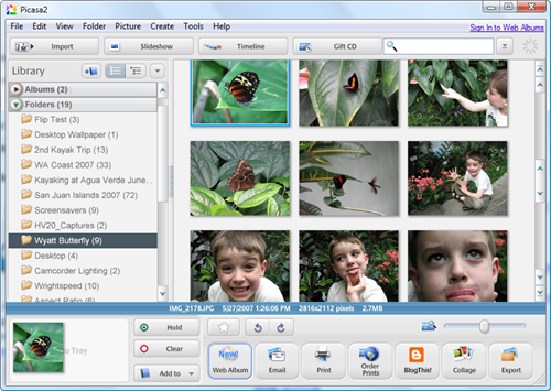 Picasa is like iPhoto for Windows